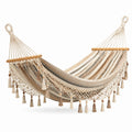 Hamac en coton avec barres en bois et franges décoratives